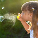 Girl Blowing Bubbles